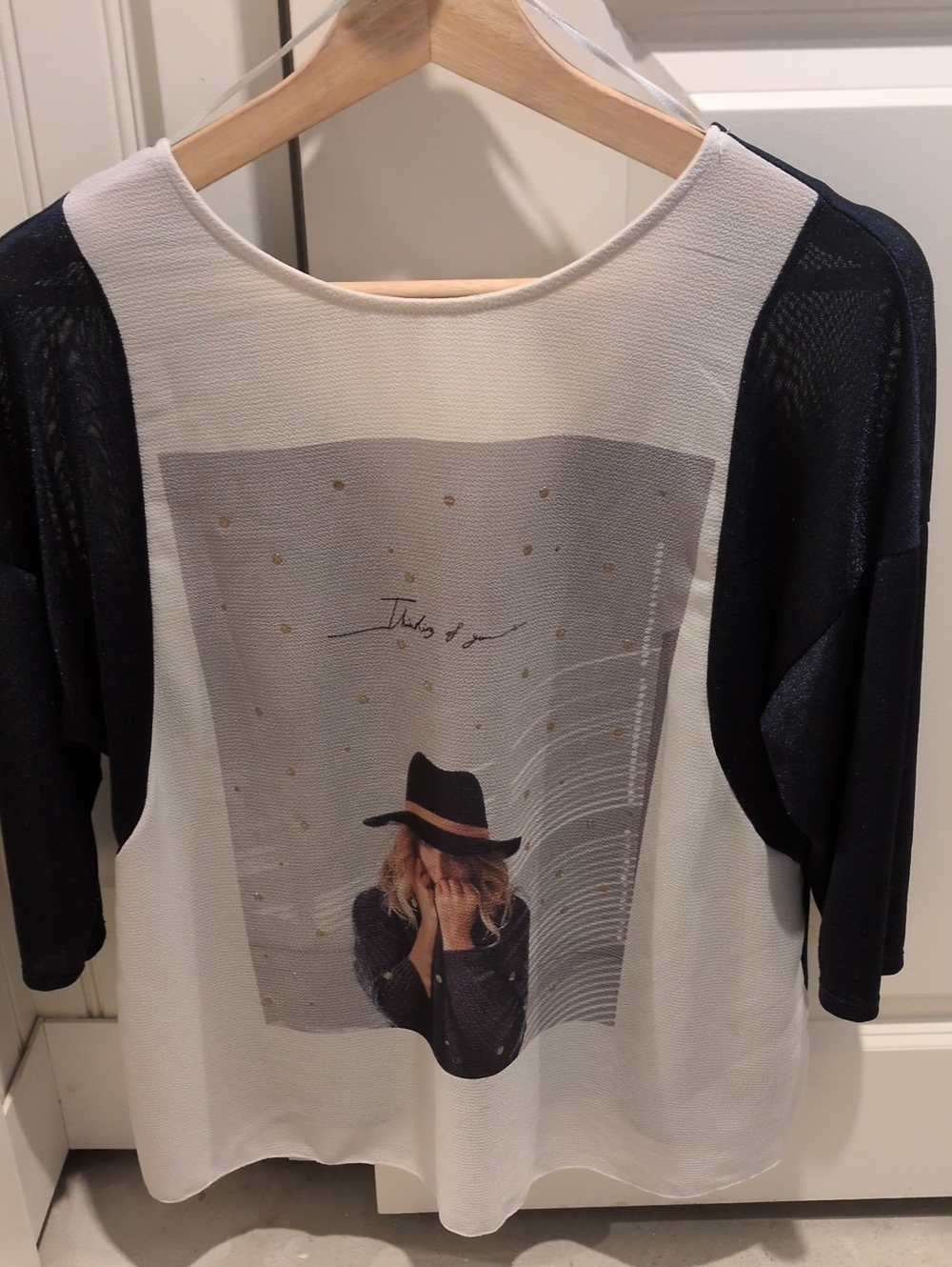 Zara Cream Front Graphic Tee with Navy Sleeves and Hat Motif